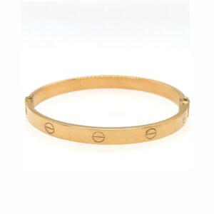 Yellow Gold Love-Inspired Bracelet with Fashionable Accents